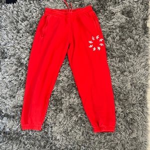 Red adidas joggers